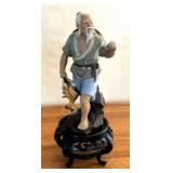 Asian Mud Man Figurine