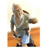 Asian Mud Man Figurine