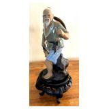 Asian Mud Man Figurine