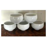 Two Teapots with Teacups including a Cast Iron Tea Kettle