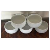 Two Teapots with Teacups including a Cast Iron Tea Kettle