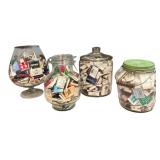 Four Glass Containers Full of Match Books