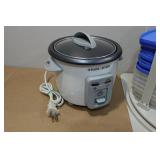 Assorted Kitchen Items - Mini Crockpot, Tupperware, Electric Knife