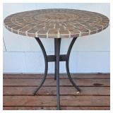 Wrought Iron and Stone Top Patio Table 28" W x 28.5" H and 2 Chairs 23" W x 35" H x 18" D. 17" Seat Height