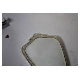 Vintage Handheld Mirror with Ornate Carved Handle and Floral Artwork