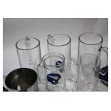 Assorted Glassware and Kitchen Measuring Tools Collection