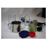 Assorted Glassware and Kitchen Measuring Tools Collection