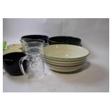 Collection of Assorted Bowls, Cups, and a Measuring Jug
