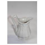 Antique White Porcelain Creamer with Floral Embossing