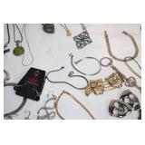 Large Assorted Costume Jewelry Lot Including Necklaces, Bracelets, and Earrings