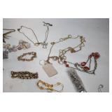 Large Assorted Costume Jewelry Lot Including Necklaces, Bracelets, and Earrings
