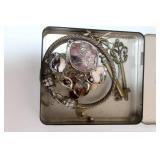 Assortment of Vintage Jewelry and Trinkets in Camel Tins