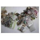 Large Lot of Assorted Jewelry and Winchester Collectible Belt Buckle