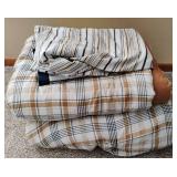 Two Twin Size Comforters and One Set of Twin Size Sheets