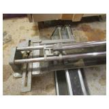 Two manual tile cutters...