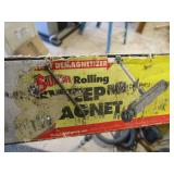 Rolling sweep magnet with magnet in...