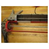 Caulking guns: regular & quart size...