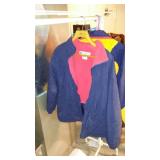 Clothes Rolling Rack With Columbia Jackets
