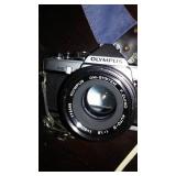 Olympus OM-2 Camera With The Accessories.