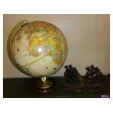 Vintage Replogle Globe and Cast Iron bookends.