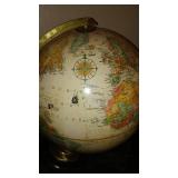 Vintage Replogle Globe and Cast Iron bookends.