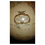 Vintage Replogle Globe and Cast Iron bookends.