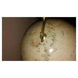 Vintage Replogle Globe and Cast Iron bookends.