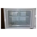 Whirlpool 115V Refrigerator with upper Freezer.