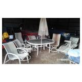 Patio Set. Table, Umbrella, Swivel Chairs (4) Chairs and More.