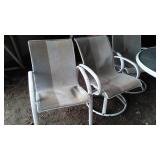 Patio Set. Table, Umbrella, Swivel Chairs (4) Chairs and More.