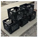 Five Black Plastic Storage Crates
