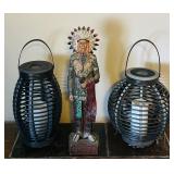 Whimsical Home Decor Including Indian Statue and Pair of Solar Candles