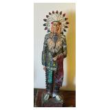 Whimsical Home Decor Including Indian Statue and Pair of Solar Candles