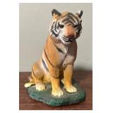 Three Tiger Figurines