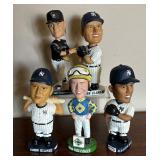 Variety of Bobble Head Figurines including Roger Clemens, Ryan Fogelsonger, Jason Giambi and More