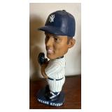 Variety of Bobble Head Figurines including Roger Clemens, Ryan Fogelsonger, Jason Giambi and More
