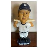 Variety of Bobble Head Figurines including Roger Clemens, Ryan Fogelsonger, Jason Giambi and More