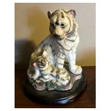 Three Tiger Figurines