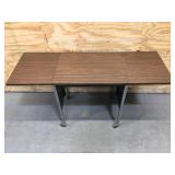 Small Brown Table on Casters
