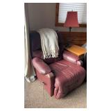 Used Burgundy Recliner Chair with White Throw Blanket