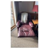 Used Burgundy Recliner Chair with White Throw Blanket