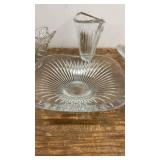 Collection of Glassware Including Bowls, Dishes, and Blue Stemmed Glasses