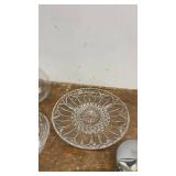 Collection of Glassware Including Bowls, Dishes, and Blue Stemmed Glasses