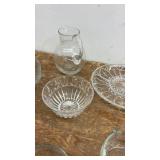 Collection of Glassware Including Bowls, Dishes, and Blue Stemmed Glasses