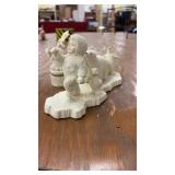 Winter-Themed Porcelain Figurine Set with Inuit Child and Animals