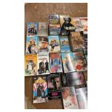 Collection of 58 Classic VHS Tapes with Family, Animation, and Action Genres