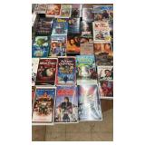 Collection of 58 Classic VHS Tapes with Family, Animation, and Action Genres