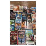 Collection of 58 Classic VHS Tapes with Family, Animation, and Action Genres