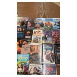 Collection of 58 Classic VHS Tapes with Family, Animation, and Action Genres