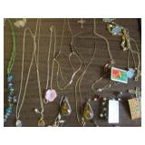 Necklaces, pendants, pins and earri...